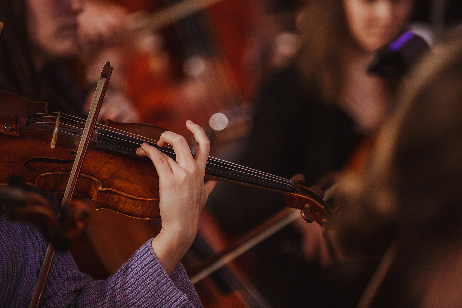 A person playing the violin