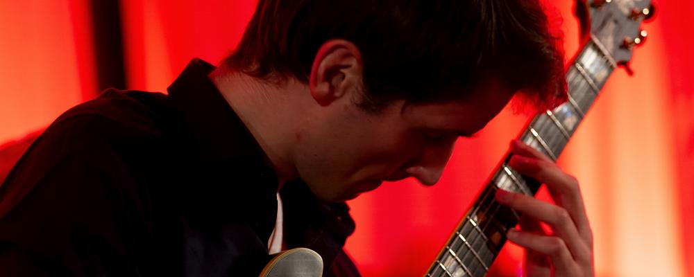 A person playing guitar