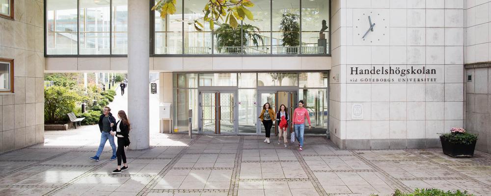 Students outside the main entrance of the School of Business, Economics and Law