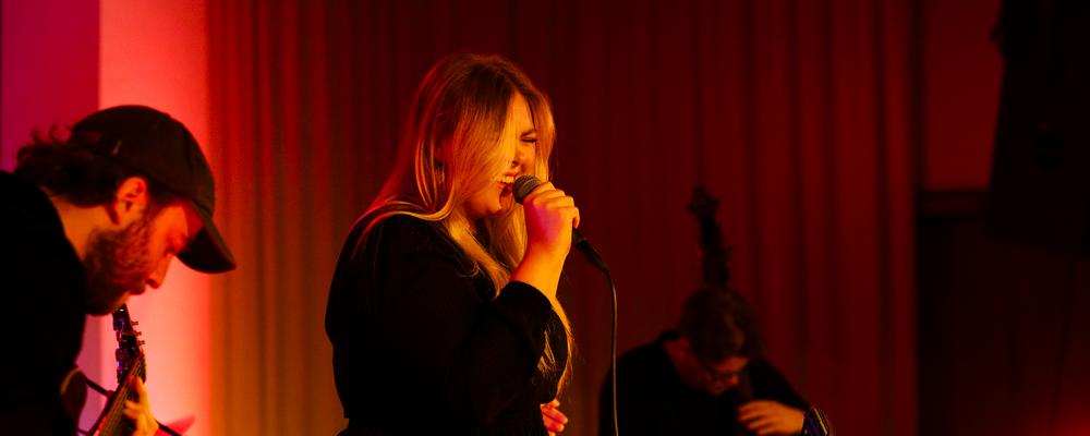 Three musicians on stage