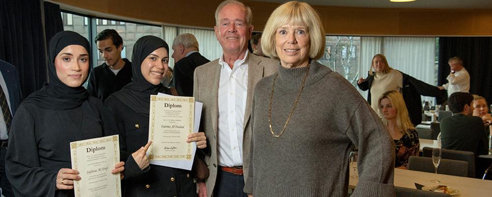 Students receive diplomas