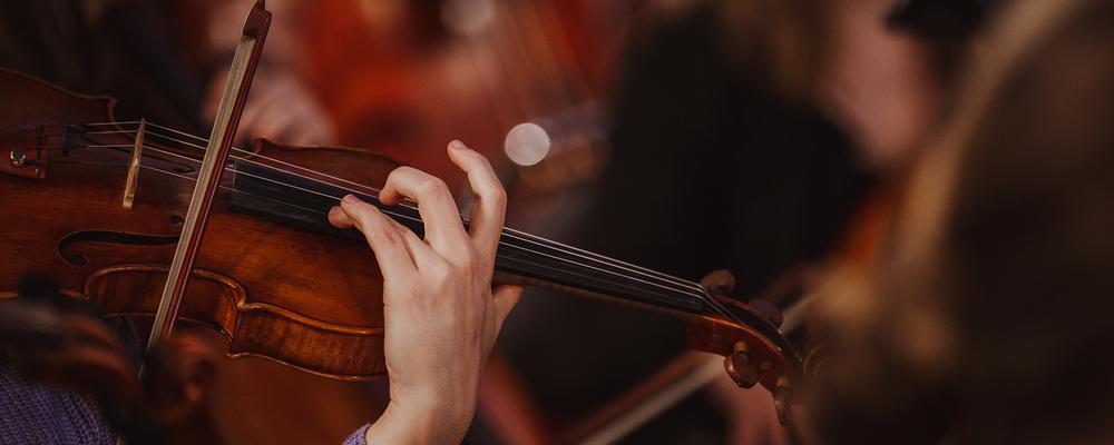 A person playing the violin