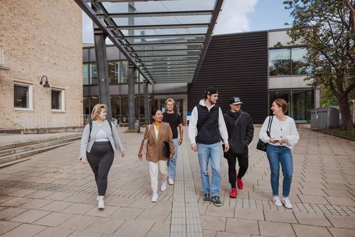 Students in front of The School of Sport Science