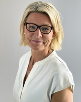 Malin Eskesjö Hansson, blond kvinna med glasögon
